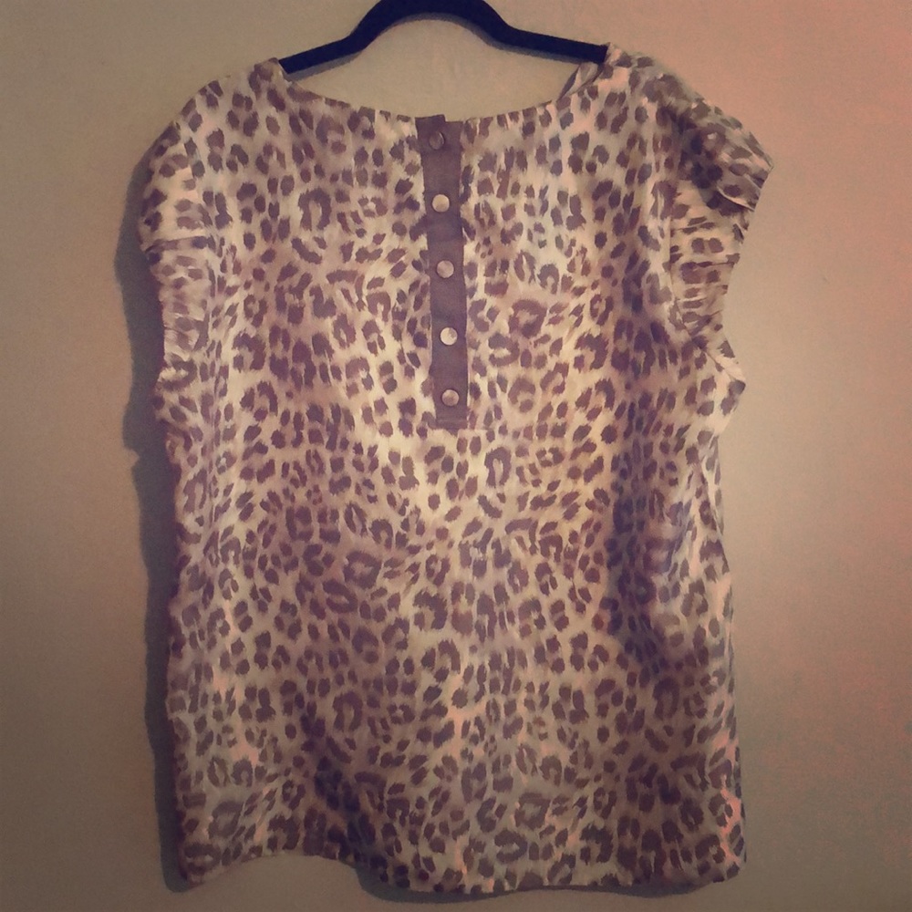 A cheetah print blouse
